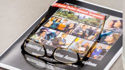 2014 SRS program on desk with glasses on top