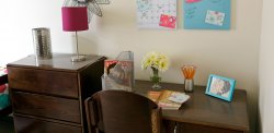 A student's bedroom desk in the Heights.