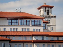 The exterior of University Hall showcasing the bell-tower and the Conference Center on the 7th Floor.