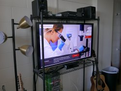 A television in a student's dorm room on the University's website.