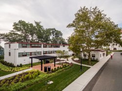 The exterior of Stone Hall from an elevated angle on a cloudy day.