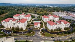 A full exterior shot of the Village Apartments from a very high angle.