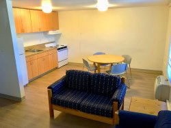 The view from the living room of a Hawk Crossings apartment looking into the kitchen.