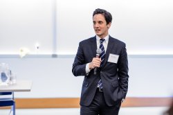 man speaking with microphone