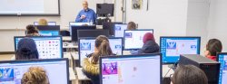 Students programming in Scratch