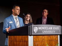 Jonathan Morgan speaking at podium