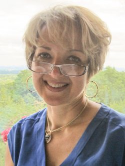 Headshot of Prof. Lucy Takagi.