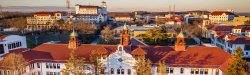 aerial view of college hall and MSU campus at sunset