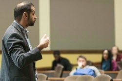 Image of a sociology faculty member speaking to a lecture hall.