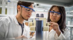 students in lab using microscope