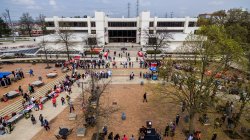 Aerial of Student Center with people in the Quad