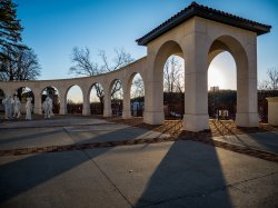 The outside of College Hall during sunset.