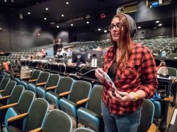 Student stage crew in auditorium seats
