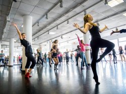 Dancing at Theater Day for high school students, being led by faculty from the Department of Theater and Dance.