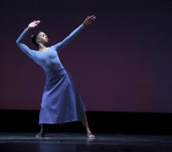 Photo of female dancer in reclined pose.