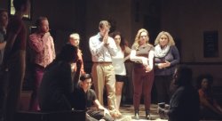 Director Wes Grantom gives students some final notes during dress rehearsal.
