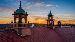 Susan A. Cole Hall bell towers at sunset