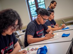 Upward Bound students working in class
