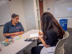 student working with tutor