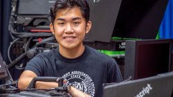 Ray Vincent De Jesus poses with video cameras and teleprompters