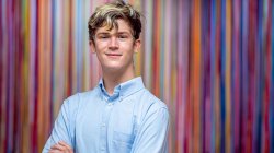 Anthony Gachetti in front of colorful wall