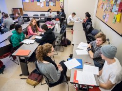 Students working on their writing in class
